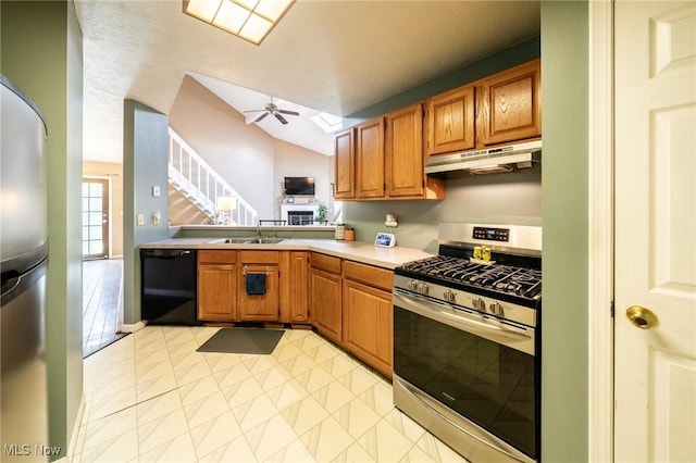 1870 E 223rd St, Euclid, OH 44117 - kitchen featuring appliances with stainless steel finishes, under cabinet range hood, light countertops, and brown cabinets