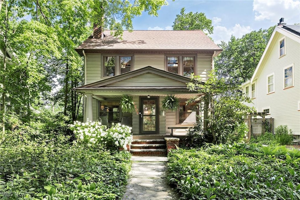 2985 Coleridge Rd, Cleveland Heights, OH 44118 - american foursquare style home with a porch, a chimney, and roof with shingles