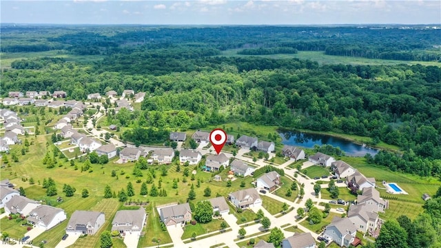 8028 Megan Meadow Dr, Hudson, OH 44236 - aerial perspective of suburban area with a heavily wooded area and a large body of water