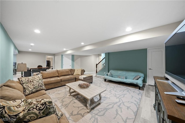 8028 Megan Meadow Dr, Hudson, OH 44236 - living room with light wood-type flooring, recessed lighting, and stairs