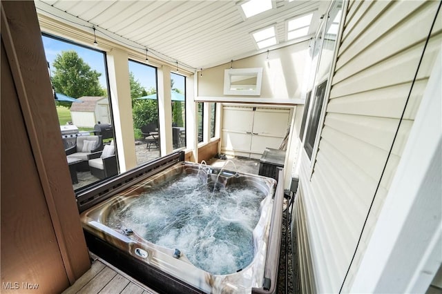 8028 Megan Meadow Dr, Hudson, OH 44236 - sunroom / solarium with a hot tub