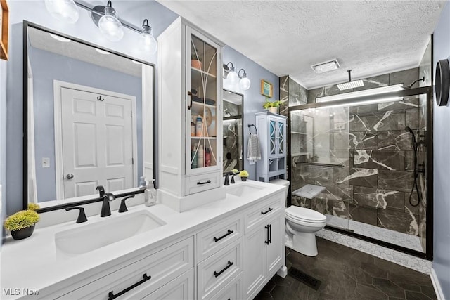 866 Brightwood Ct, Brunswick, OH 44212 - bathroom with a marble finish shower, double vanity, and a textured ceiling