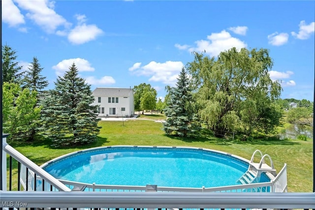 866 Brightwood Ct, Brunswick, OH 44212 - outdoor pool featuring a lawn
