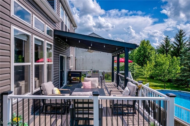 866 Brightwood Ct, Brunswick, OH 44212 - wooden deck with outdoor lounge area, a ceiling fan, and an outdoor pool