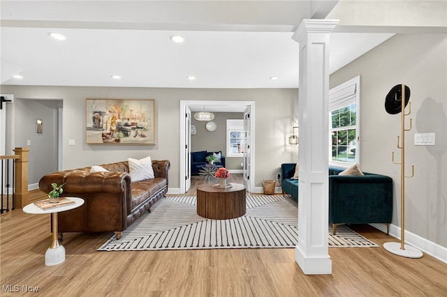 14370 Washington Blvd, University Heights, OH 44118 - living area with light wood-style flooring, ornate columns, and recessed lighting