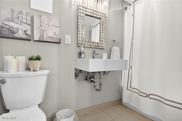 14370 Washington Blvd, University Heights, OH 44118 - bathroom with tile patterned floors and a shower with shower curtain