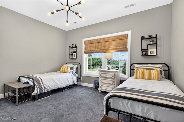 14370 Washington Blvd, University Heights, OH 44118 - carpeted bedroom with a chandelier and baseboards