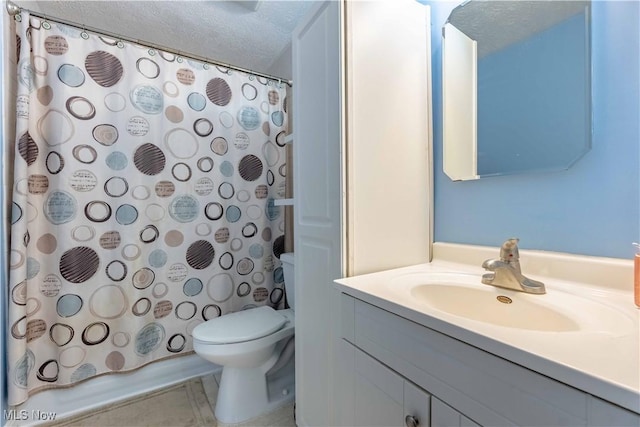 4950 Trafalgar St SW, Canton, OH 44706 - full bath with vanity, a shower with curtain, a textured ceiling, and tile patterned flooring