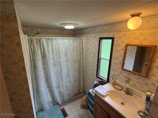 44534 US Highway 36, Coshocton, OH 43812 - full bathroom featuring vanity, wallpapered walls, a textured ceiling, tile patterned flooring, and a shower with curtain