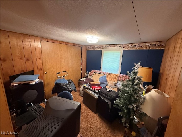 44534 US Highway 36, Coshocton, OH 43812 - carpeted bedroom with wood walls and a textured ceiling