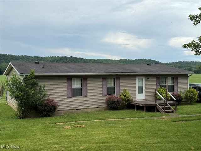 44534 US Highway 36, Coshocton, OH 43812 - back of property with a yard, crawl space, and roof with shingles