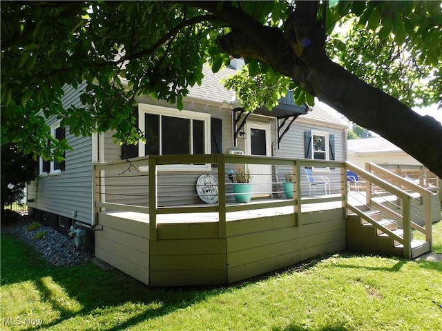 2804 Avon Blvd, Ashtabula, OH 44004 - rear view of property featuring a yard, a wooden deck, and roof with shingles
