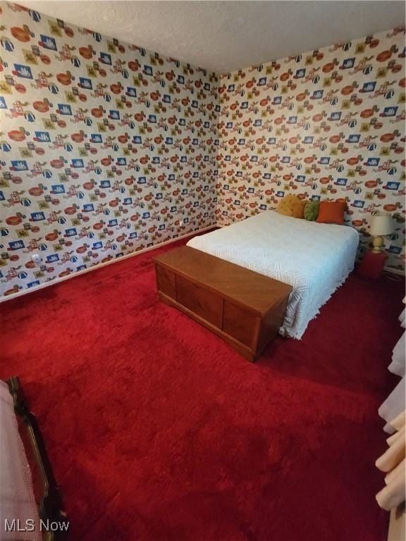 5622 Donna Dr, Ashtabula, OH 44004 - bedroom featuring carpet, a textured ceiling, and wallpapered walls