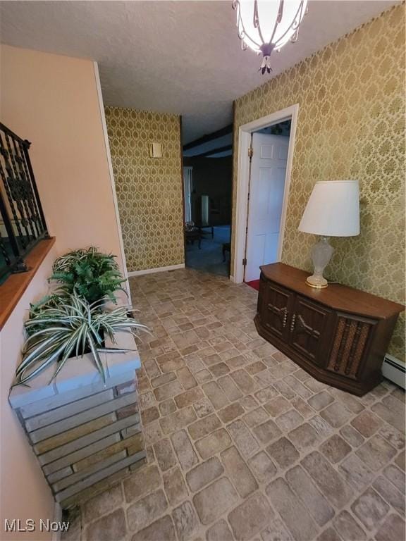 5622 Donna Dr, Ashtabula, OH 44004 - corridor with wallpapered walls and baseboard heating