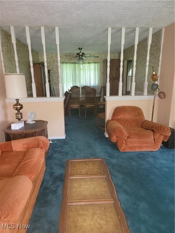 5622 Donna Dr, Ashtabula, OH 44004 - living room featuring ceiling fan, carpet, and a textured ceiling