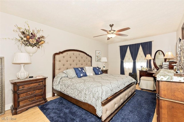 7148 N Brewster Pl, Concord, OH 44077 - bedroom featuring wood finished floors and a ceiling fan