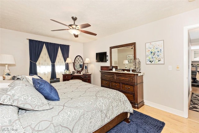 7148 N Brewster Pl, Concord, OH 44077 - bedroom featuring light wood-style floors and a ceiling fan