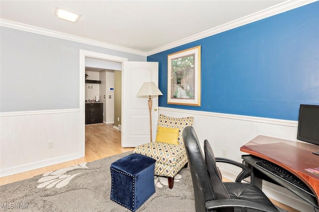 7148 N Brewster Pl, Concord, OH 44077 - office with wood finished floors, a wainscoted wall, and ornamental molding