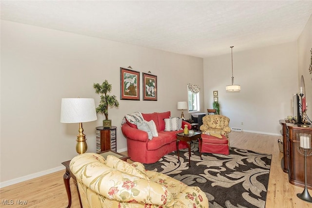 7148 N Brewster Pl, Concord, OH 44077 - living room with wood finished floors and baseboards