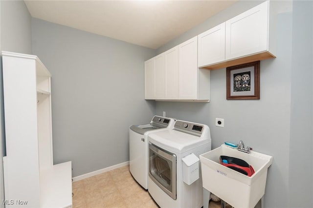 3139 Junior Pkwy, Brunswick, OH 44212 - laundry room with cabinet space and washing machine and clothes dryer