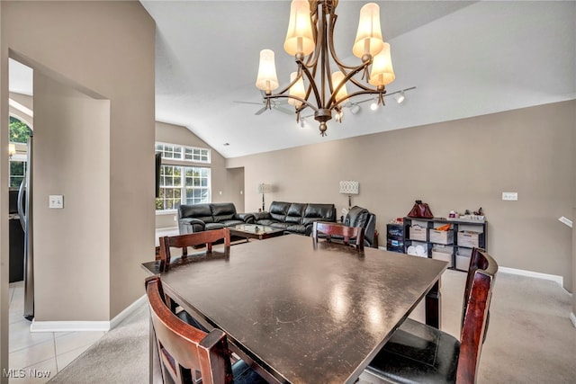 254 Vista Cir, North Olmsted, OH 44070 - dining area with a chandelier and vaulted ceiling