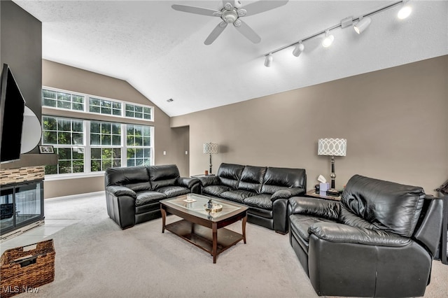 254 Vista Cir, North Olmsted, OH 44070 - living area with a ceiling fan, carpet floors, lofted ceiling, and a textured ceiling