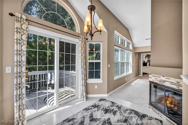 254 Vista Cir, North Olmsted, OH 44070 - doorway with tile patterned floors, healthy amount of natural light, carpet, and high vaulted ceiling