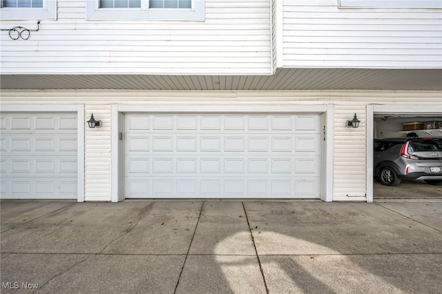 254 Vista Cir, North Olmsted, OH 44070 - garage featuring concrete driveway