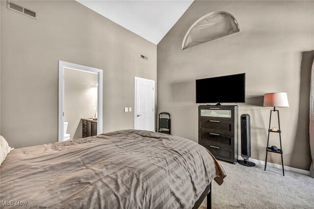 254 Vista Cir, North Olmsted, OH 44070 - carpeted bedroom with high vaulted ceiling and ensuite bath