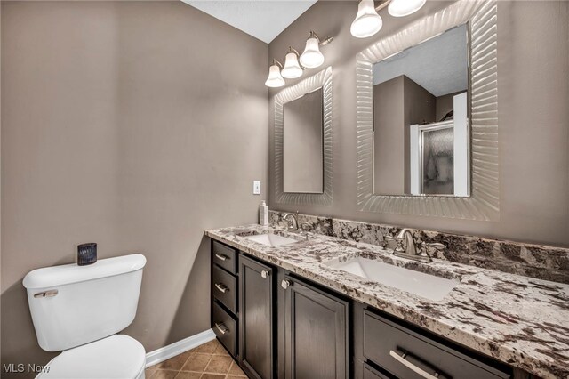 254 Vista Cir, North Olmsted, OH 44070 - bathroom with double vanity, a stall shower, and tile patterned flooring