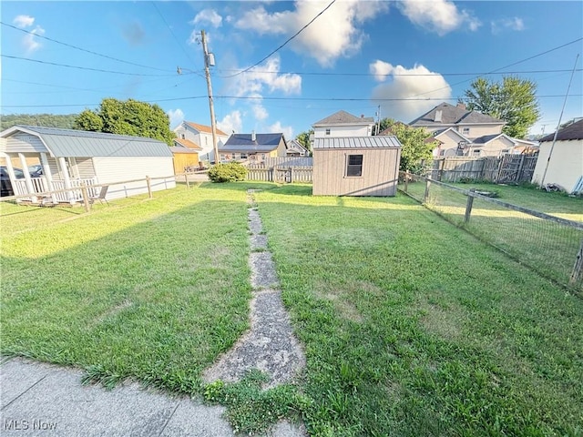 707 Jefferson St, Toronto, OH 43964 - fenced backyard featuring a residential view and a storage shed
