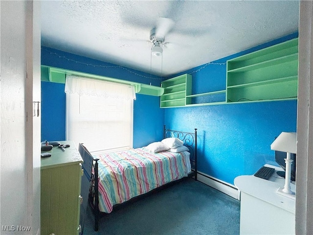 707 Jefferson St, Toronto, OH 43964 - carpeted bedroom with a baseboard heating unit, a textured ceiling, and ceiling fan
