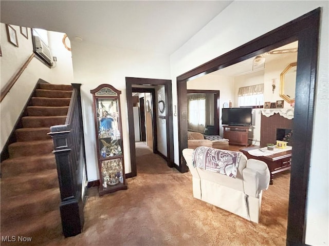 707 Jefferson St, Toronto, OH 43964 - carpeted living area featuring stairway and a fireplace