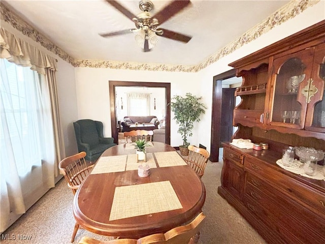 707 Jefferson St, Toronto, OH 43964 - dining area with light carpet and ceiling fan