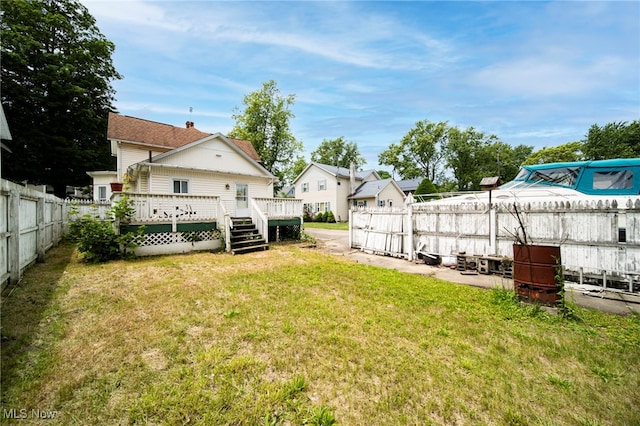 238 Whitney St, Conneaut, OH 44030 - fenced backyard with a wooden deck