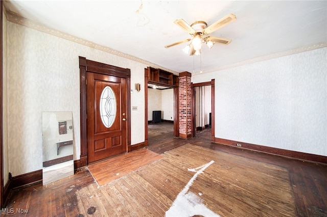 238 Whitney St, Conneaut, OH 44030 - entryway with hardwood / wood-style floors, a ceiling fan, wallpapered walls, and crown molding