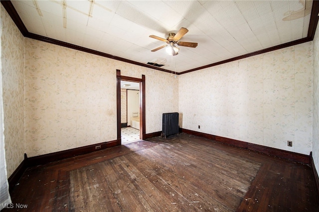 238 Whitney St, Conneaut, OH 44030 - unfurnished room with radiator heating unit, dark wood-style flooring, ornamental molding, a ceiling fan, and wallpapered walls