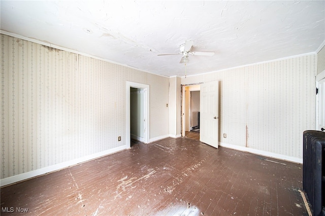 238 Whitney St, Conneaut, OH 44030 - unfurnished room with ornamental molding, ceiling fan, and hardwood / wood-style flooring