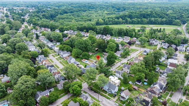 238 Whitney St, Conneaut, OH 44030 - aerial view of property and surrounding area featuring nearby suburban area and a heavily wooded area