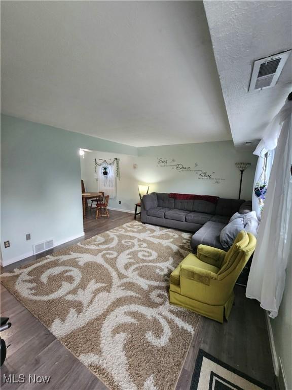 4211 Dennis Ln, Brunswick, OH 44212 - living room with wood finished floors and baseboards