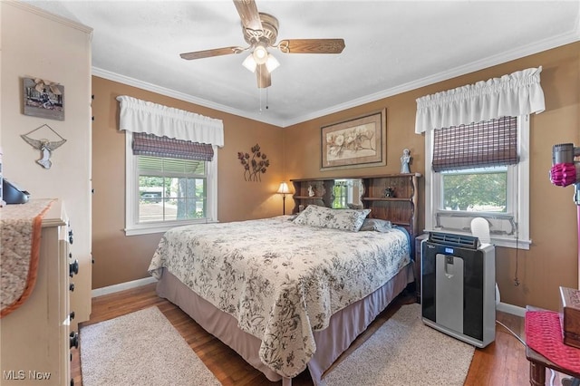 4843 Summer Ln, Brooklyn, OH 44144 - bedroom with multiple windows, light wood-style floors, crown molding, and ceiling fan