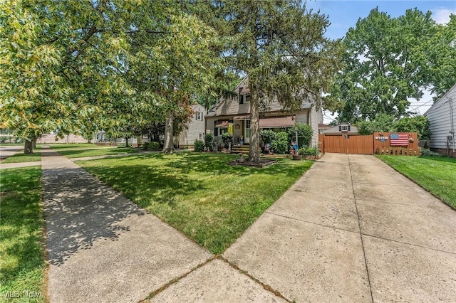 4843 Summer Ln, Brooklyn, OH 44144 - view of property hidden behind natural elements featuring a gate