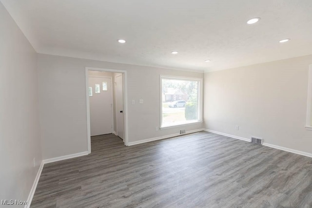 4033 Stonehaven Rd, South Euclid, OH 44121 - spare room featuring wood finished floors and recessed lighting