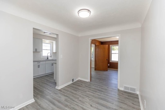 4033 Stonehaven Rd, South Euclid, OH 44121 - unfurnished room with light wood-style flooring and plenty of natural light