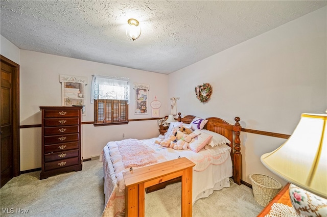 278 Rosewae Ave, Cortland, OH 44410 - carpeted bedroom featuring a textured ceiling and baseboards