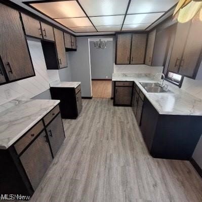 726 Orlo Ln, Boardman, OH 44512 - kitchen with light wood-type flooring and light countertops