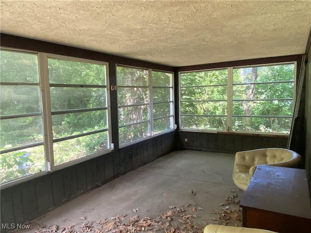 726 Orlo Ln, Boardman, OH 44512 - unfurnished sunroom with concrete flooring, a textured ceiling, and healthy amount of natural light