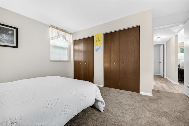 4183 Columbia Rd, North Olmsted, OH 44070 - bedroom featuring multiple closets and carpet flooring