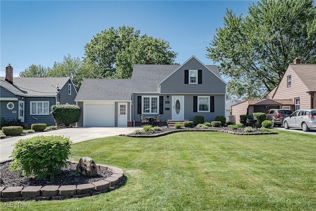 29511 Grand Blvd, Wickliffe, OH 44092 - view of front of home featuring an attached garage, concrete driveway, a front yard, and roof with shingles