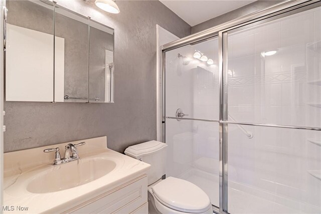 29511 Grand Blvd, Wickliffe, OH 44092 - full bath featuring a stall shower, vanity, and a textured wall
